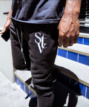 Load image into Gallery viewer, Si Tu Veux - Logo Stacked sweatpants - BLK - Clique Apparel